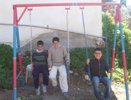 Boys on swing