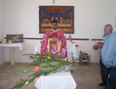 Priest blessing the olive and palm branches